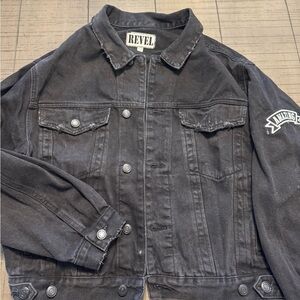 Revel black Jean jacket with sequin angel wings on back.